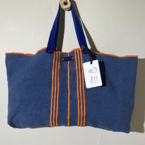 bolso lino azul con bordados naranja