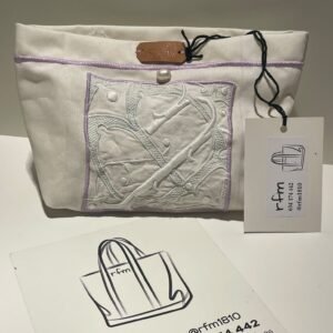 neceser de algodón con bordados violeta y aplique